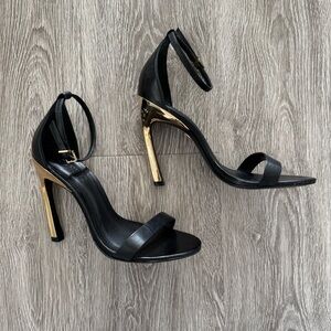 Elegant Black and Gold Stiletto Heels